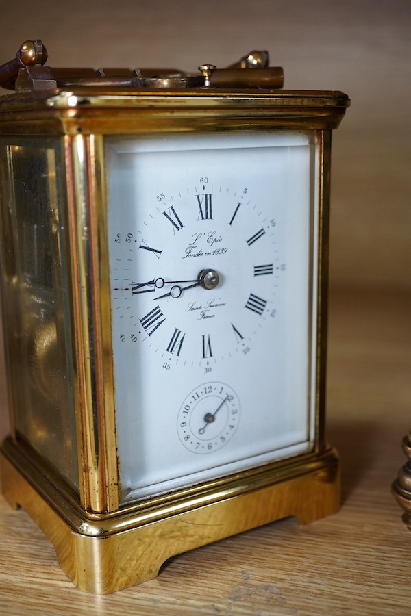 A French brass repeating carriage clock, together with another enamelled dial carriage clock, both with keys, tallest 15cm. Condition - not tested